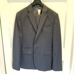 Full suit (pants and jacket.) Light navy blue.